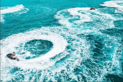 Jet Skiing around La famille ship and smaller pristine cays - Getting to Caribbean Cruisin: the easy part, and the part to double-check